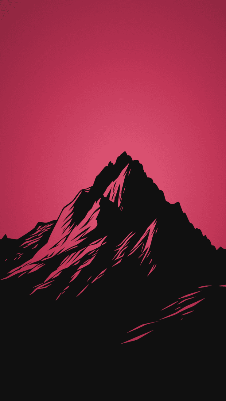 A black mountain peak against a glowing magenta sky